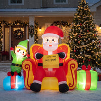 Tangkula Christmas Inflatable Santa Claus on Sofa with Elf & Gift Boxes